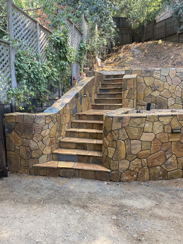 Stone patio installation — Oak River Landscaping