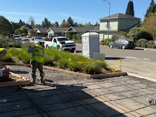 Fresh concrete driveway pour in progress